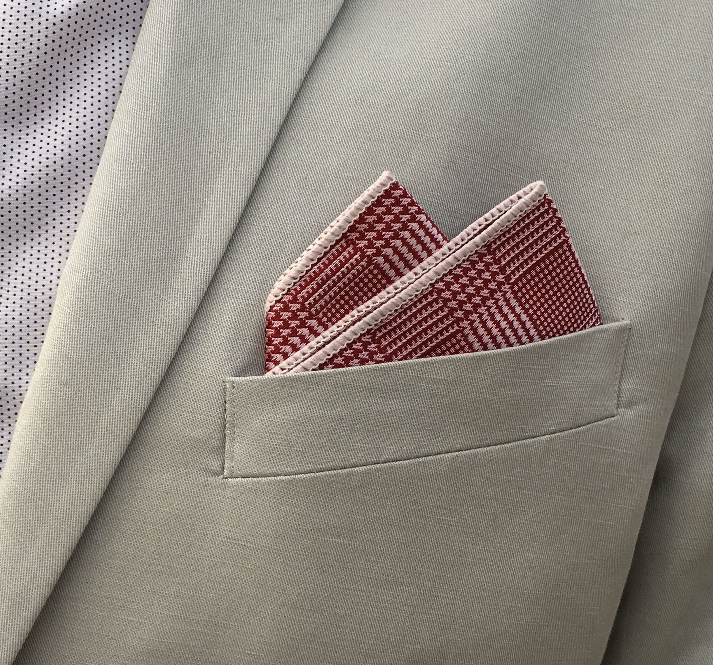 Two gentlemen together with a pretty women showing their classy di Venisco pocket square.